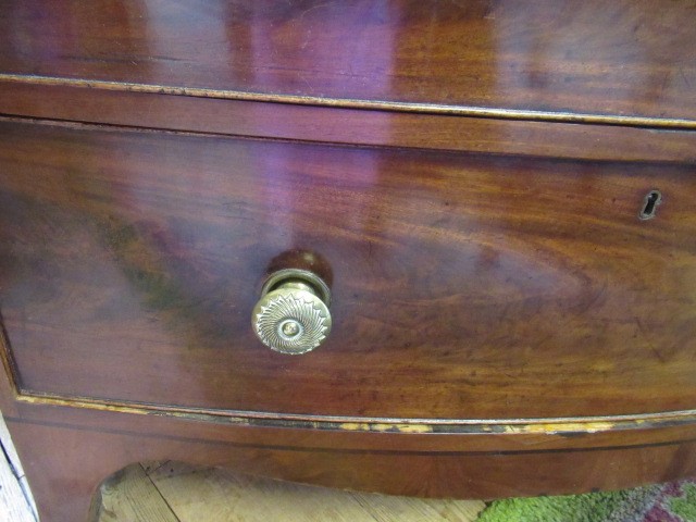 A REGENCY MAHOGANY BOWED CHEST Image