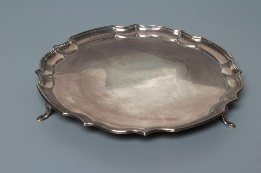 A SILVER SALVER, by Douglas Heeley, Sheffield 1961, of shaped circular form with pie-crust rim and Image
