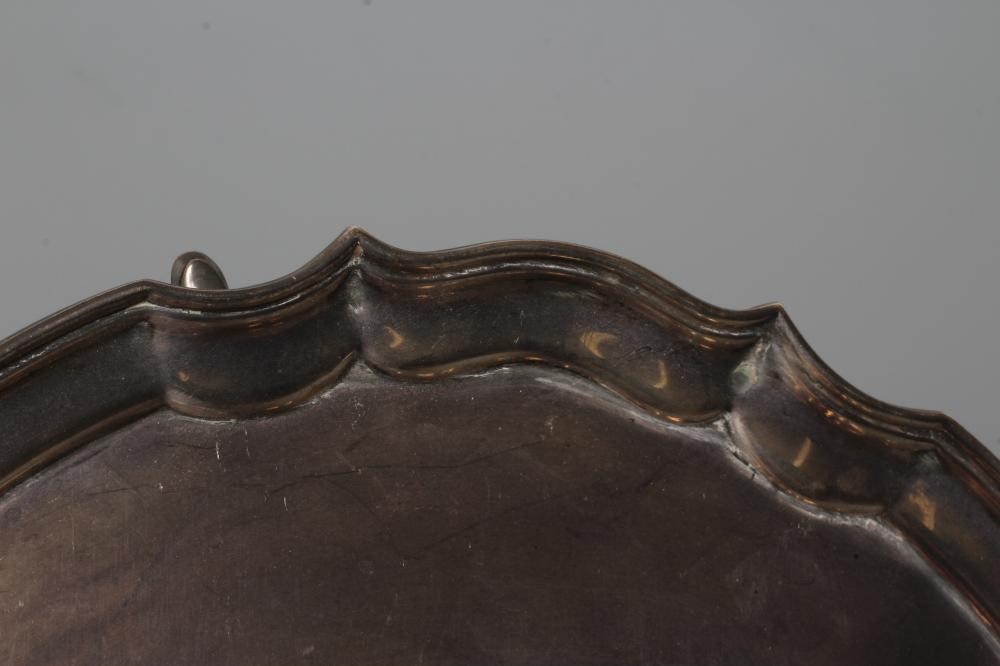 A SILVER SALVER, by Douglas Heeley, Sheffield 1961, of shaped circular form with pie-crust rim and Image