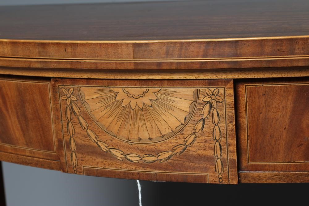 AN EDWARDIAN FOLDING TEA TABLE of demi lune form in the neo-classical style Image