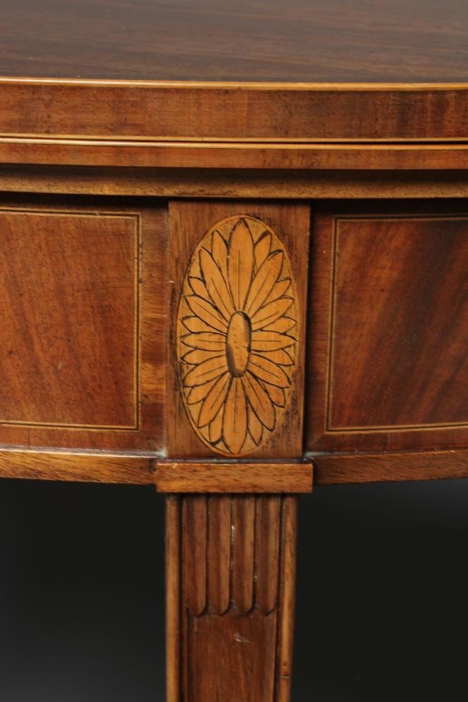 AN EDWARDIAN FOLDING TEA TABLE of demi lune form in the neo-classical style Image