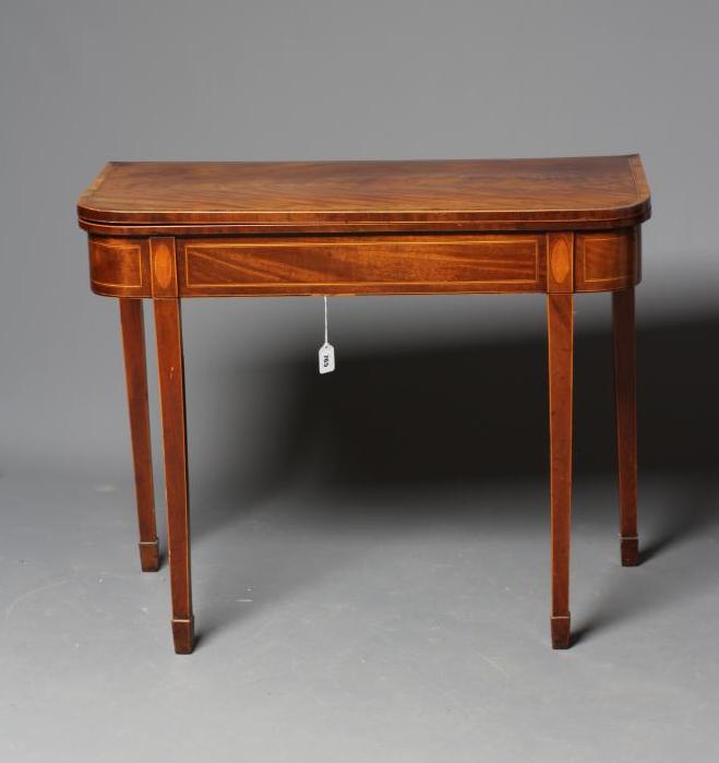 A GEORGIAN MAHOGANY FOLDING TEA TABLE Image