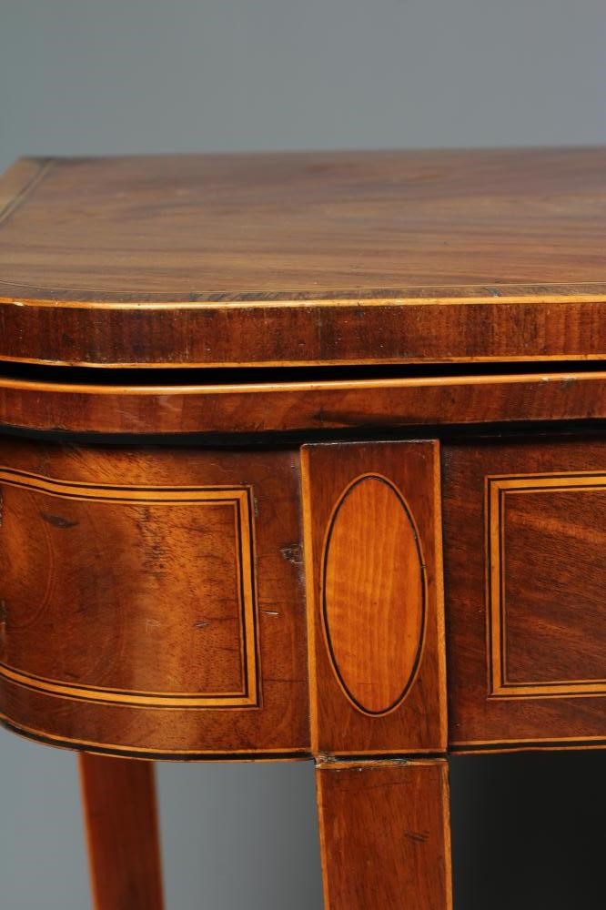 A GEORGIAN MAHOGANY FOLDING TEA TABLE Image
