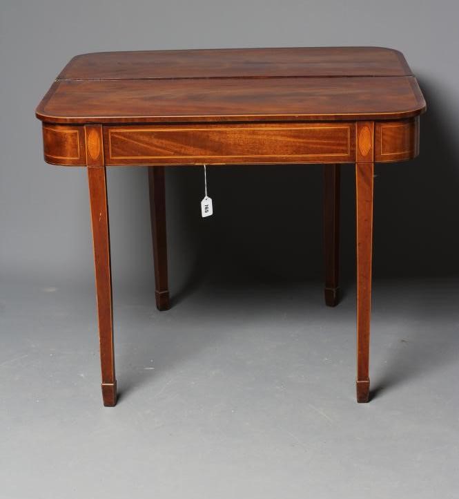 A GEORGIAN MAHOGANY FOLDING TEA TABLE Image