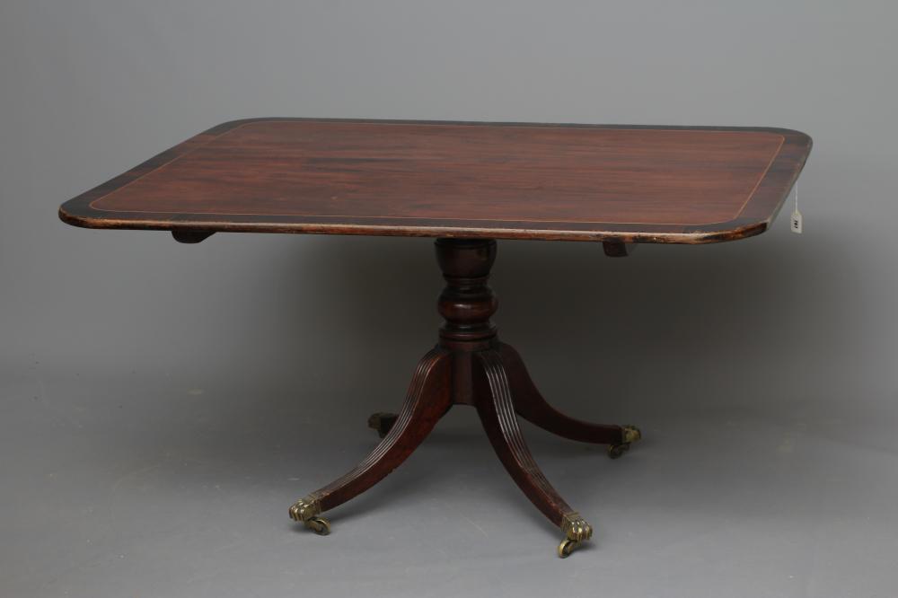 A GEORGIAN MAHOGANY BREAKFAST TABLE Image