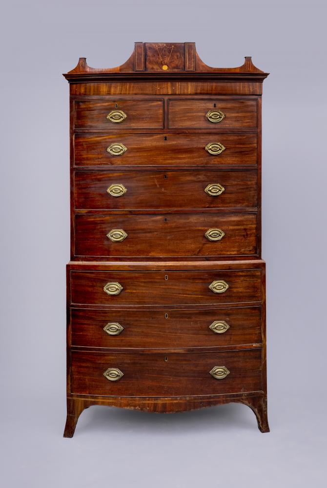 A GEORGIAN MAHOGANY BOWED CHEST ON CHEST Image
