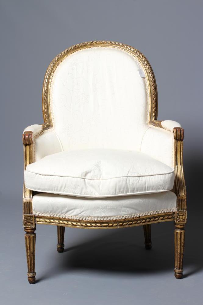 A LOUIS XV STYLE CARVED GILTWOOD FAUTEUIL Image