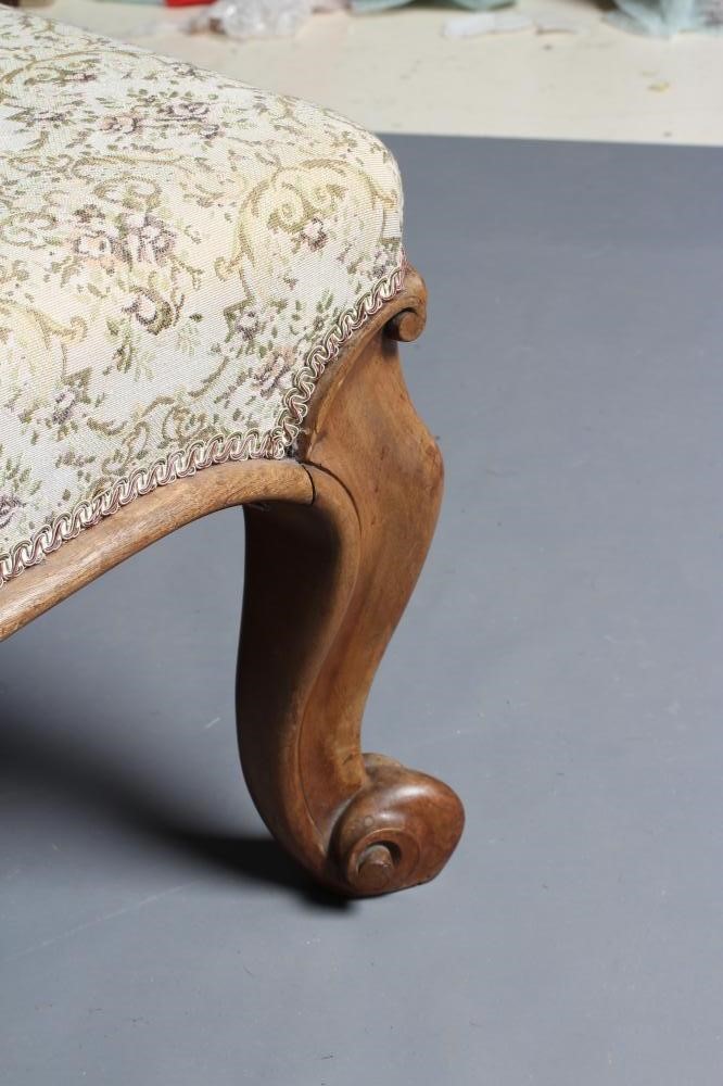 A VICTORIAN MAHOGANY LARGE STOOL of oblong form upholstered in a cream floral weave Image