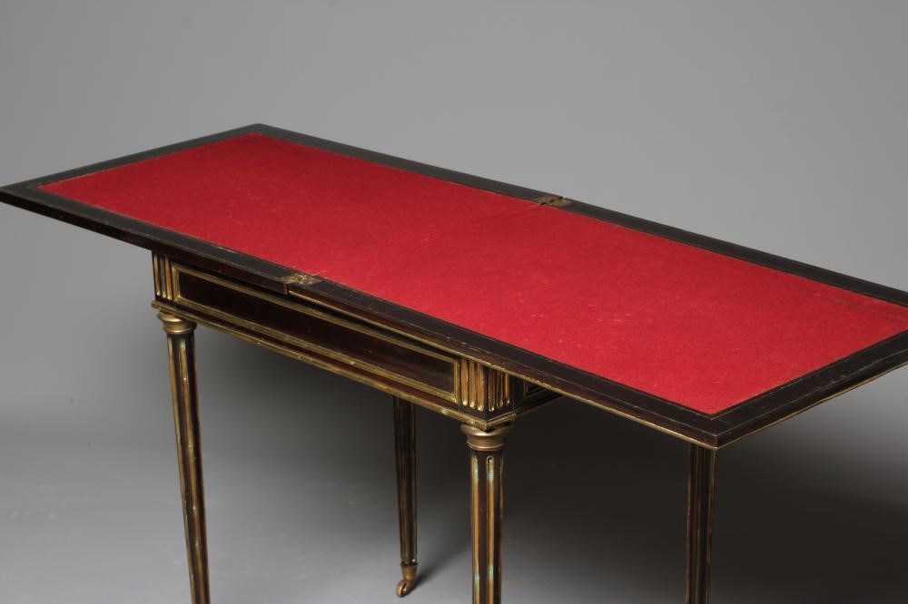 A FRENCH ROSEWOOD FOLDING GAMES TABLE Image