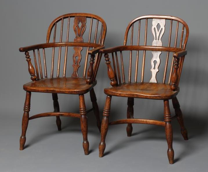 A PAIR OF ASH AND ELM LOW WINDSOR ARMCHAIRS Image