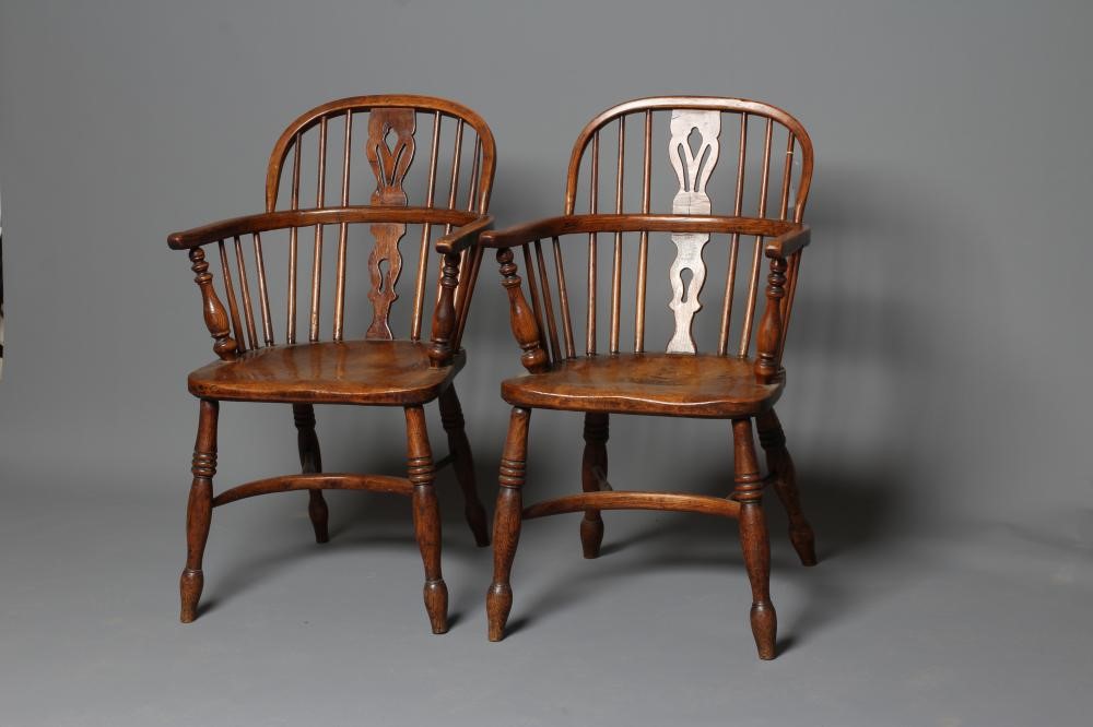 A PAIR OF ASH AND ELM LOW WINDSOR ARMCHAIRS Image