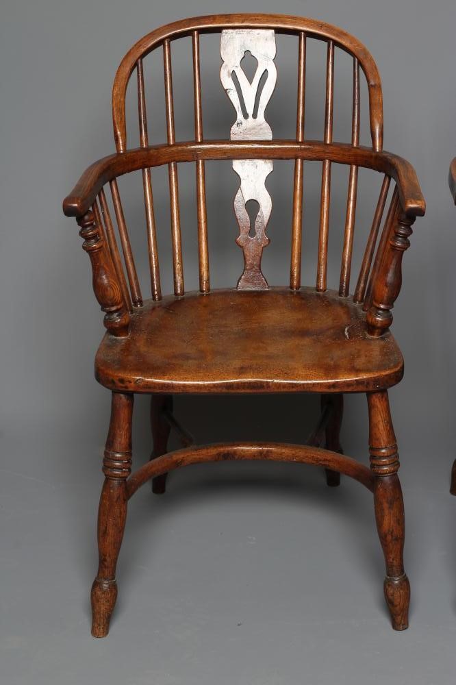A PAIR OF ASH AND ELM LOW WINDSOR ARMCHAIRS Image
