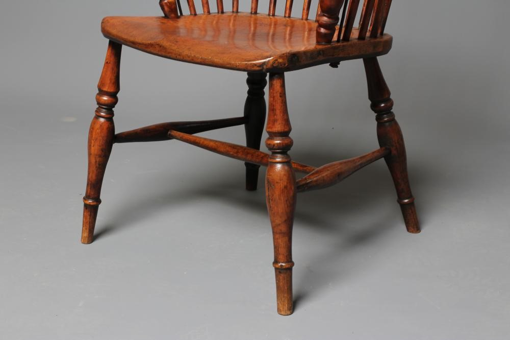 AN ASH AND ELM STICK BACK WINDSOR ARMCHAIR Image