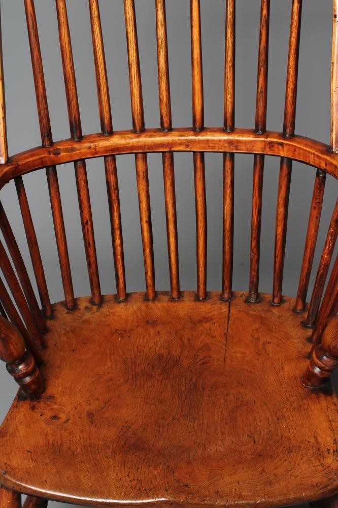 AN ASH AND ELM STICK BACK WINDSOR ARMCHAIR Image