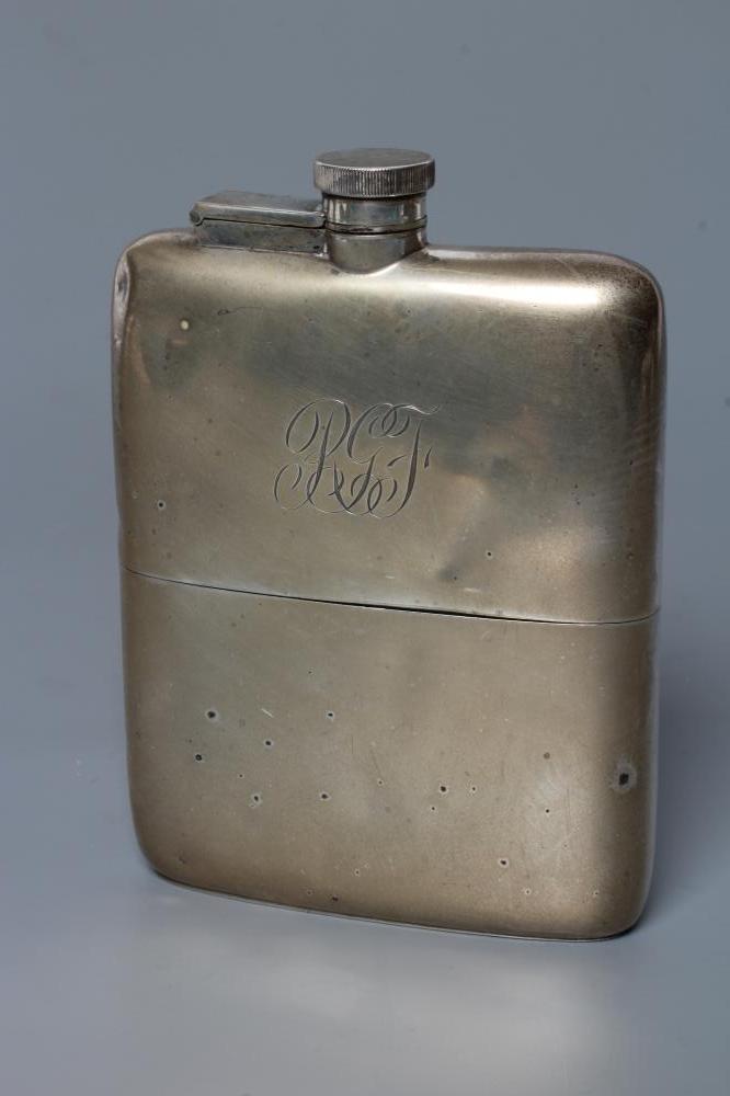 A SILVER HIP FLASK, by William Neale & Son Ltd., Birmingham probably 1920, of plain rounded oblong Image