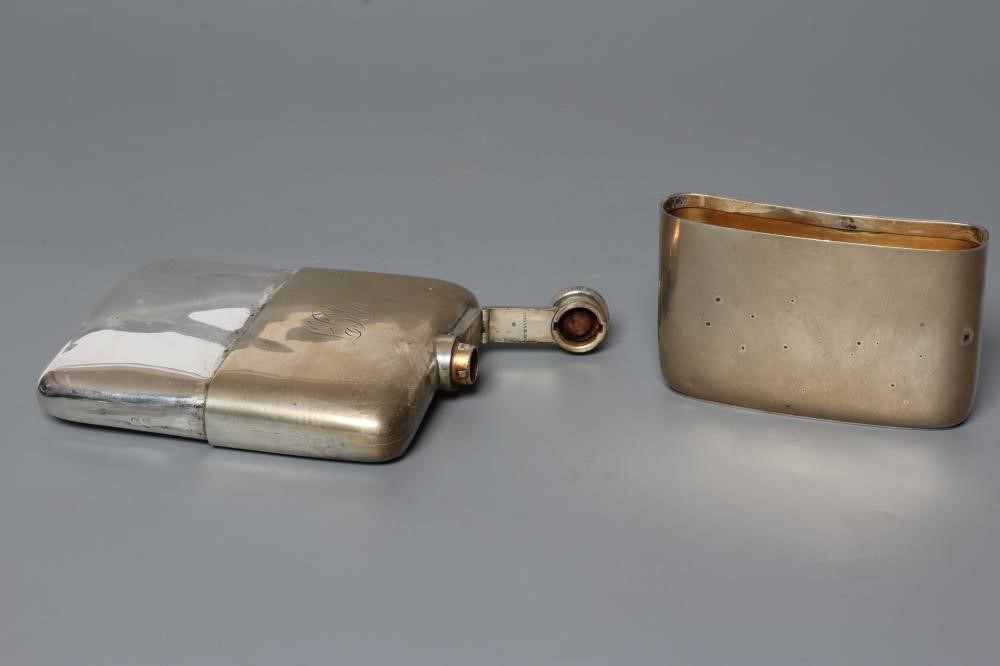 A SILVER HIP FLASK, by William Neale & Son Ltd., Birmingham probably 1920, of plain rounded oblong Image