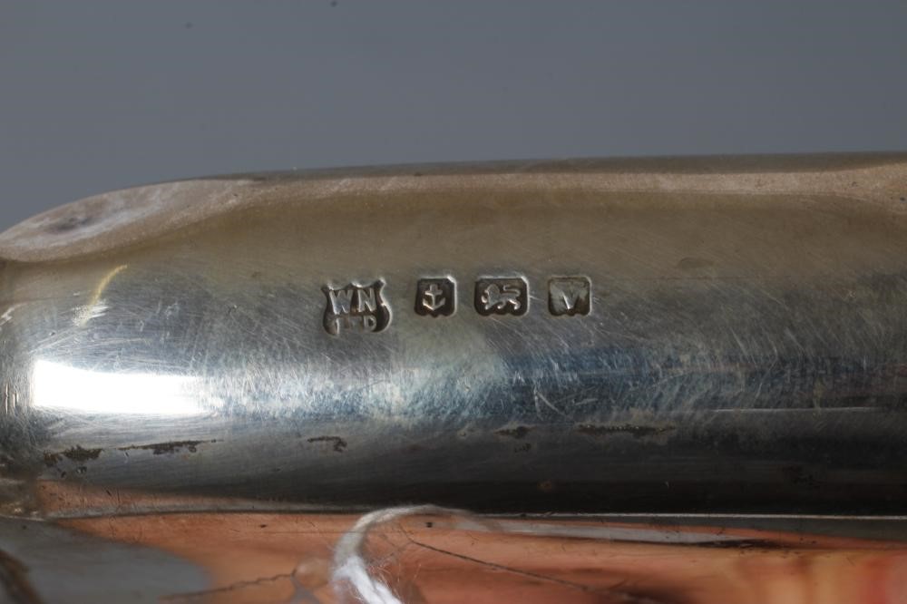 A SILVER HIP FLASK, by William Neale & Son Ltd., Birmingham probably 1920, of plain rounded oblong Image