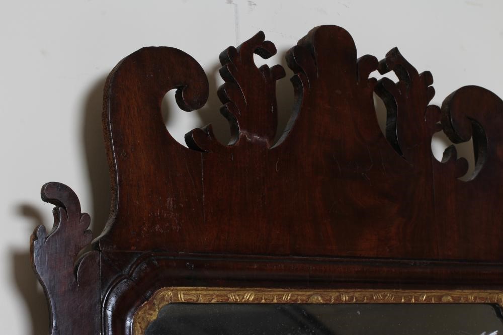 A GEORGIAN MAHOGANY FRETWORK MIRROR Image