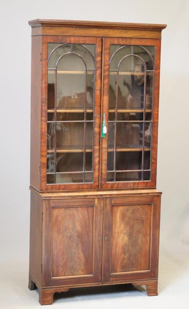 A MAHOGANY BOOKCASE Image