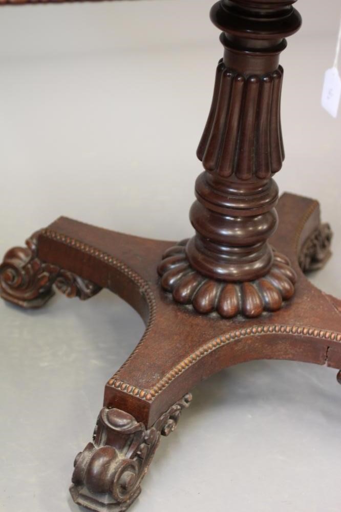 A REGENCY MAHOGANY FOLDING TEA TABLE Image