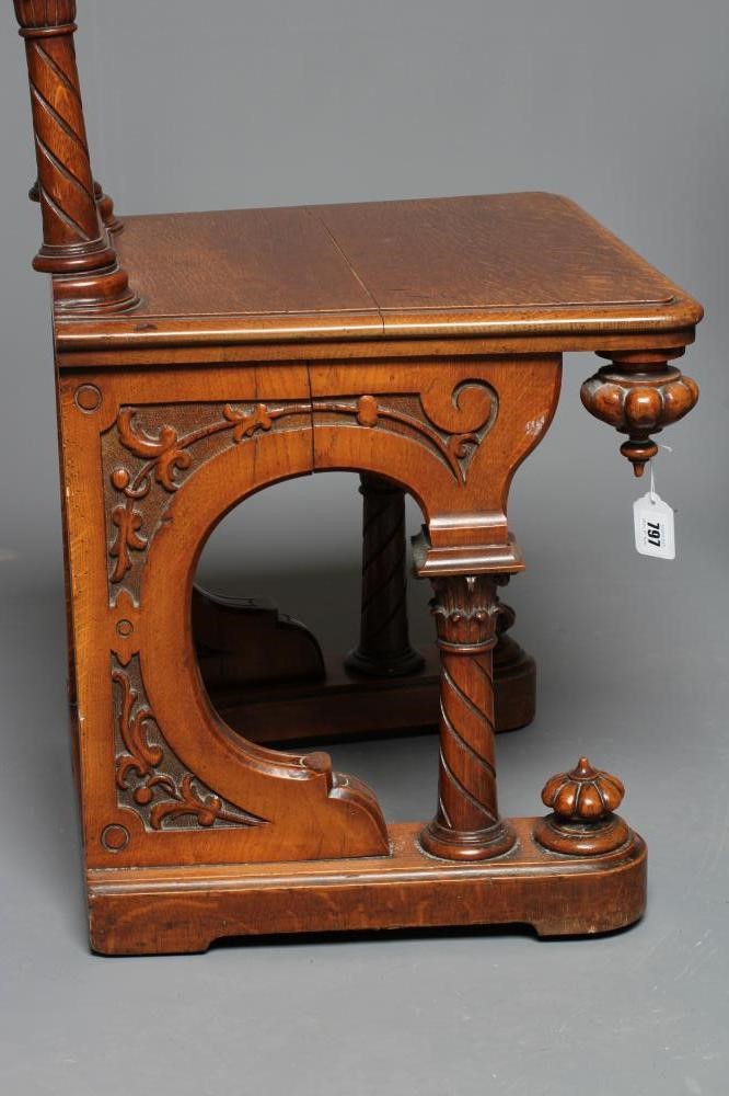 A PAIR OF VICTORIAN GOTHIC CARVED LIGHT OAK HALL CHAIRS Image