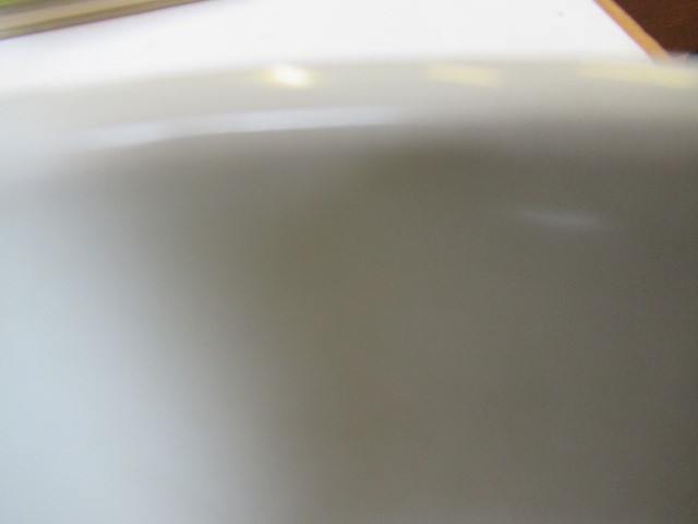 A CHINESE PORCELAIN SHALLOW BOWL of plain circular form, the exterior painted in underglaze blue Image