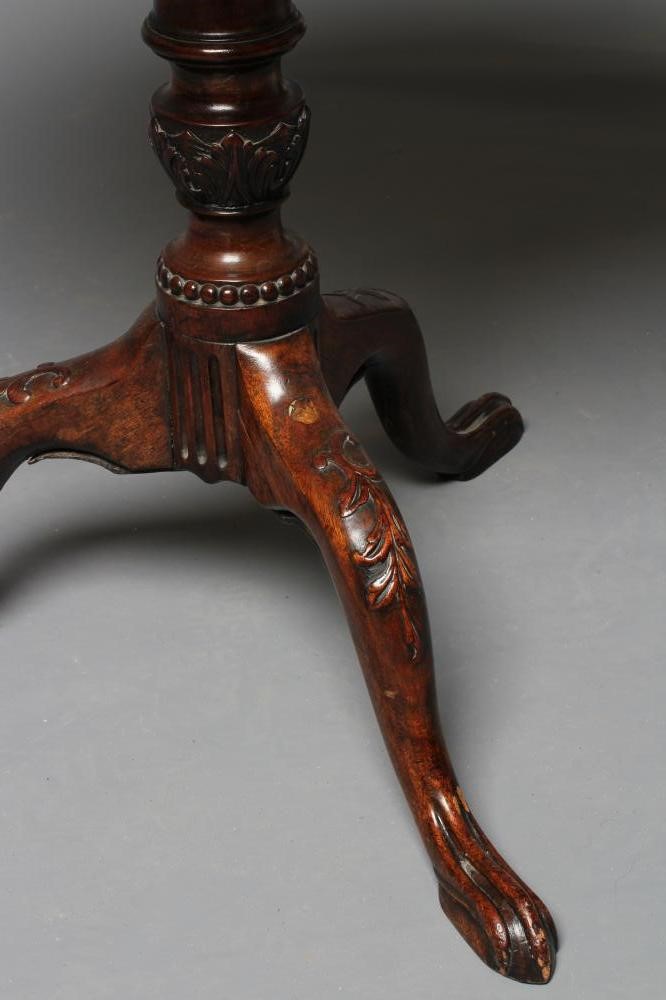 A MAHOGANY TILT TOP TABLE Image