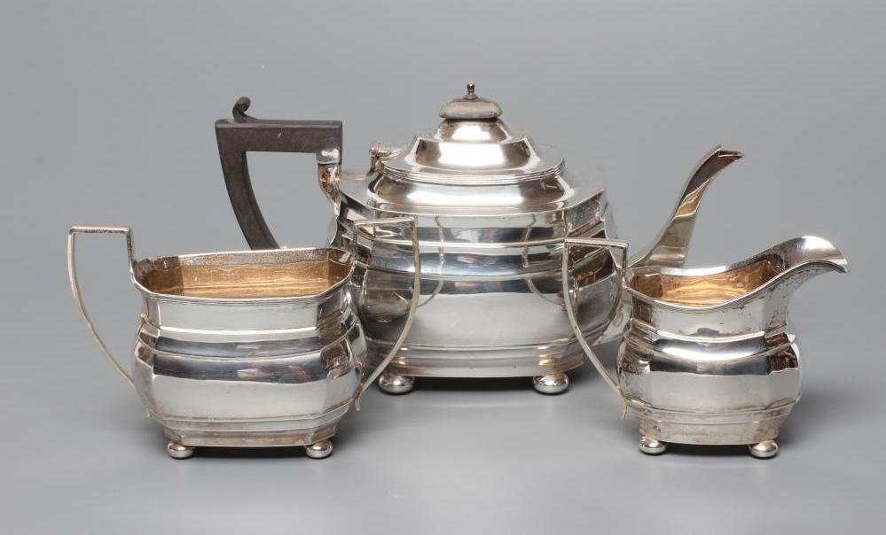 A THREE PIECE SILVER TEA SERVICE Image