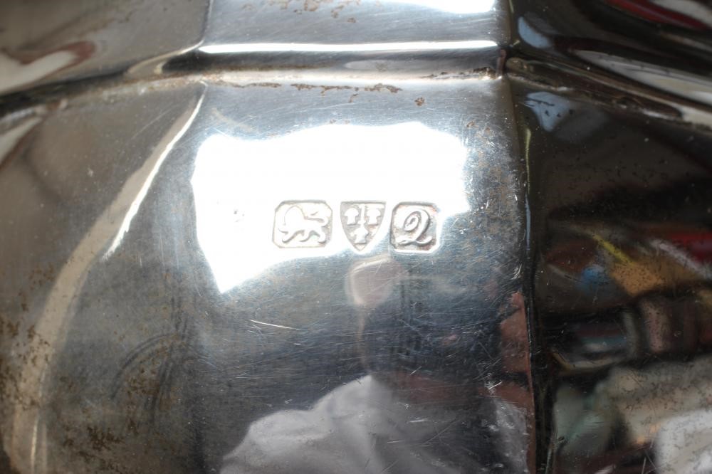 A THREE PIECE SILVER TEA SERVICE Image