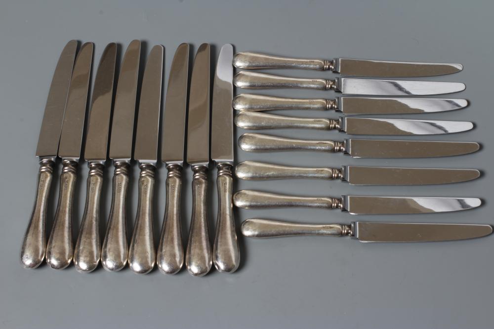 A SET OF EIGHT EACH SILVER TABLE AND DESSERT KNIVES, by Terry Shaverin, Sheffield 1991, with steel Image
