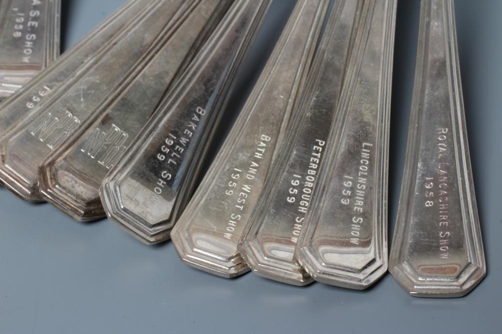 A COLLECTION OF FIFTEEN SILVER DESSERT SPOONS Image