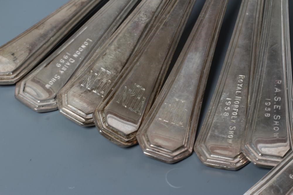 A COLLECTION OF FIFTEEN SILVER DESSERT SPOONS Image