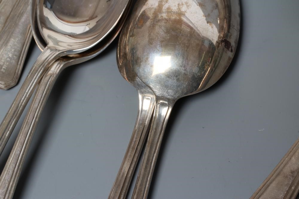 A COLLECTION OF FIFTEEN SILVER DESSERT SPOONS Image