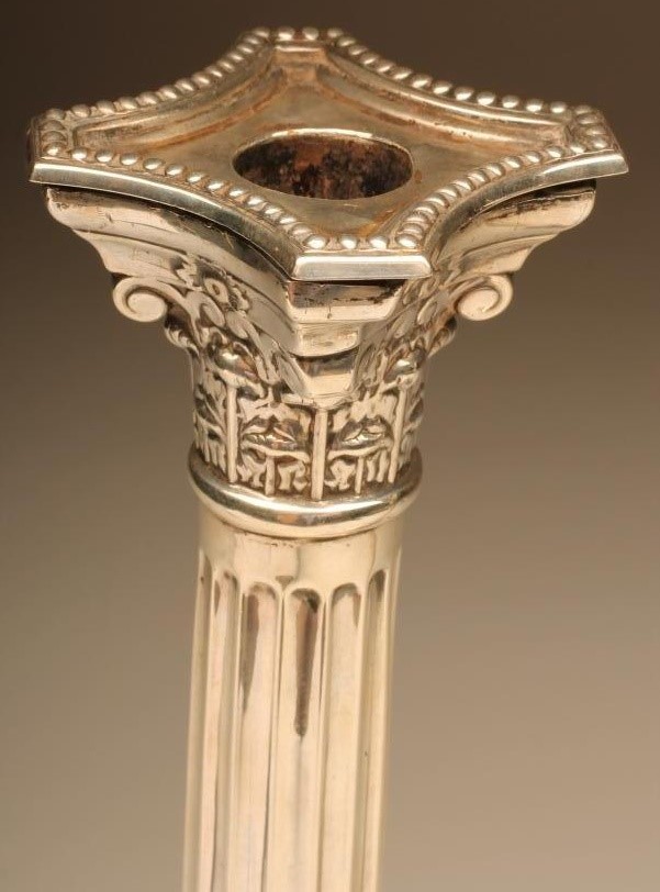 A PAIR OF SILVER CORINTHIAN COLUMN CANDLESTICKS Image
