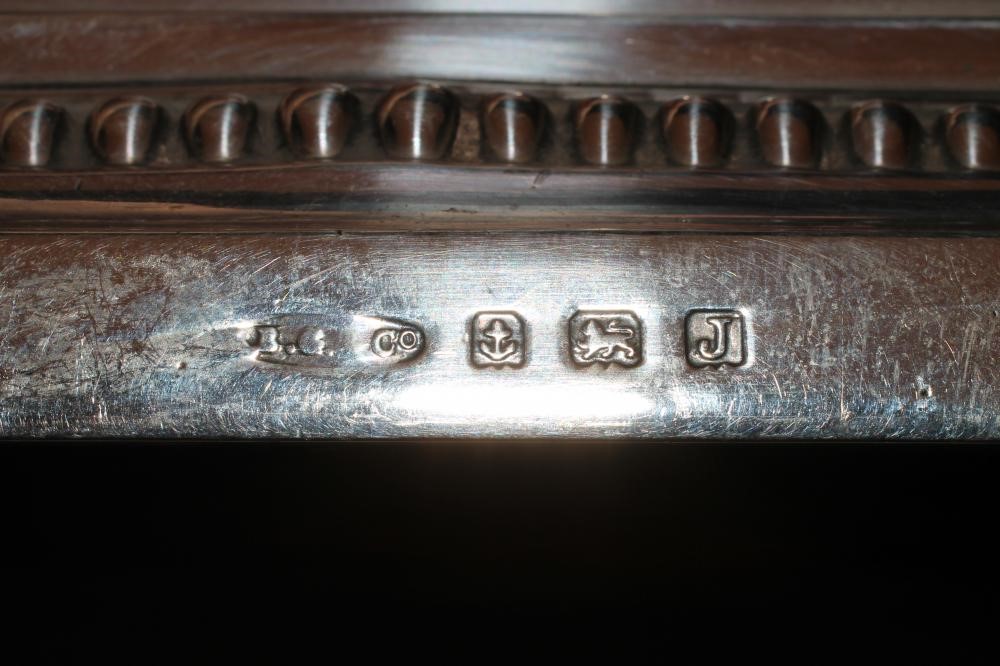 A PAIR OF SILVER CORINTHIAN COLUMN CANDLESTICKS Image