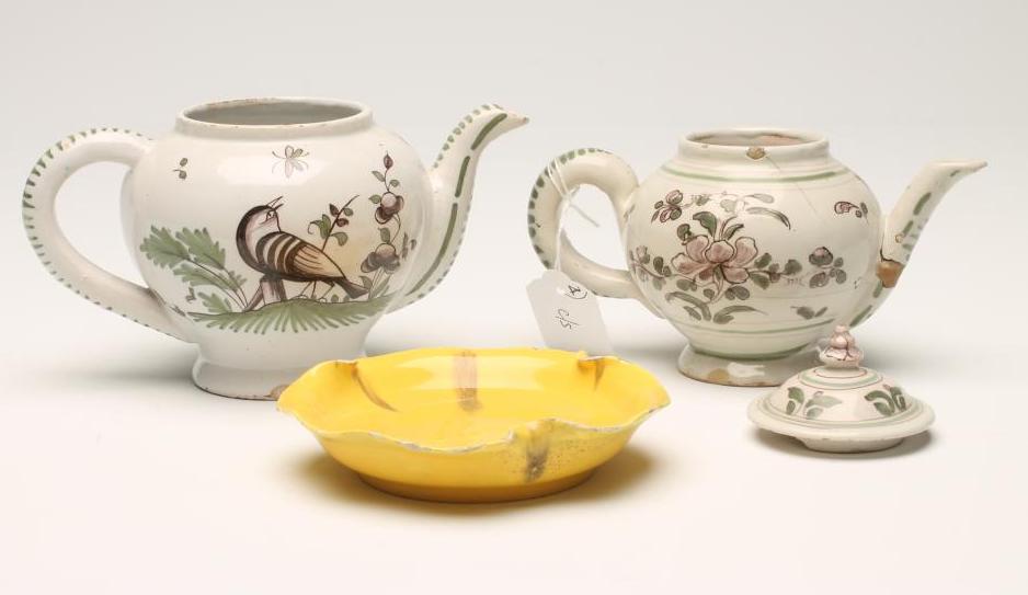 TWO FRENCH FAIENCE TEAPOTS Image