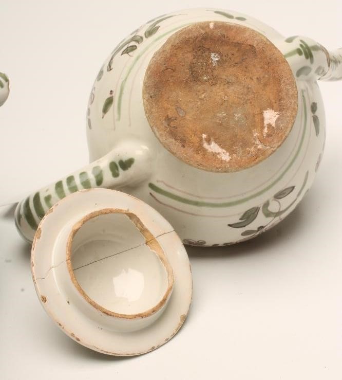 TWO FRENCH FAIENCE TEAPOTS Image