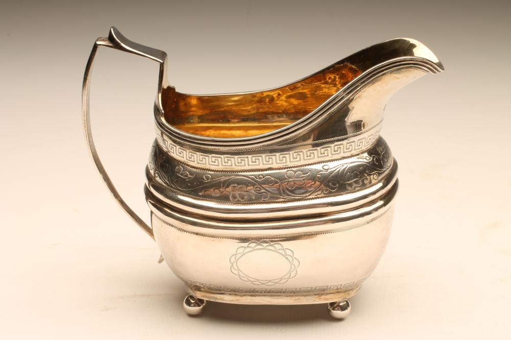 A GEORGE III SILVER MILK jug Image