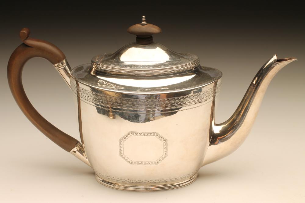 A LATE GEORGE III SILVER TEAPOT Image