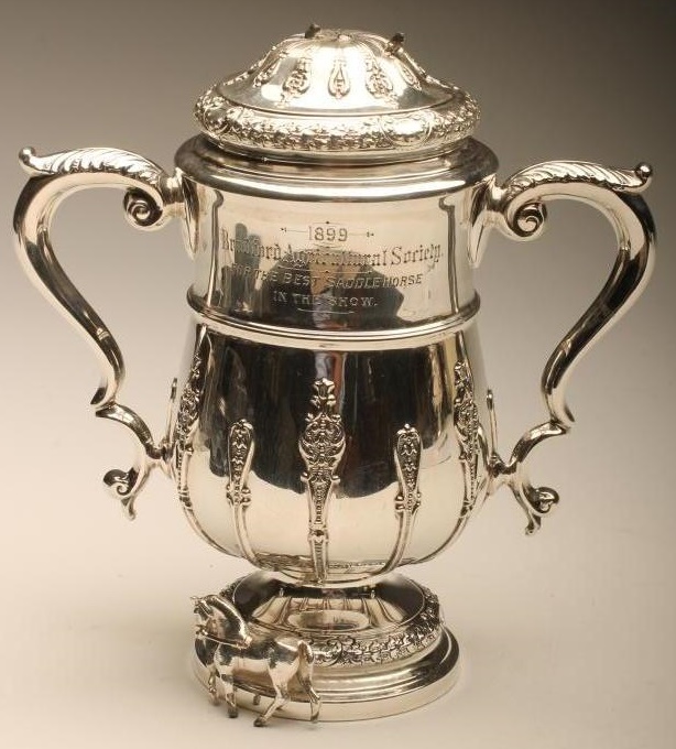 A LATE VICTORIAN SILVER TROPHY CUP AND COVER Image