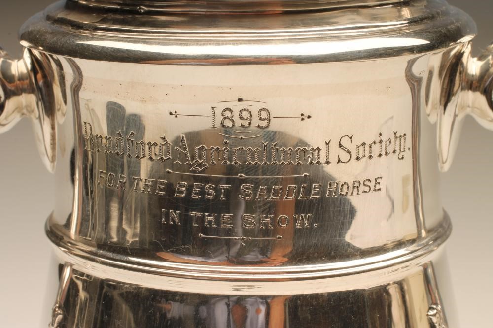 A LATE VICTORIAN SILVER TROPHY CUP AND COVER Image