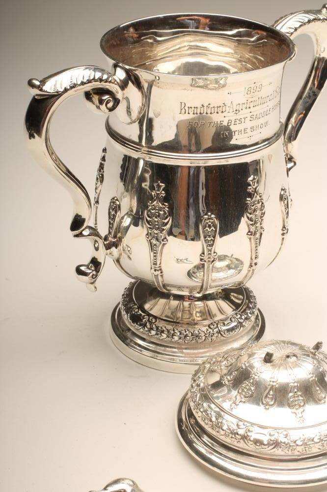 A LATE VICTORIAN SILVER TROPHY CUP AND COVER Image