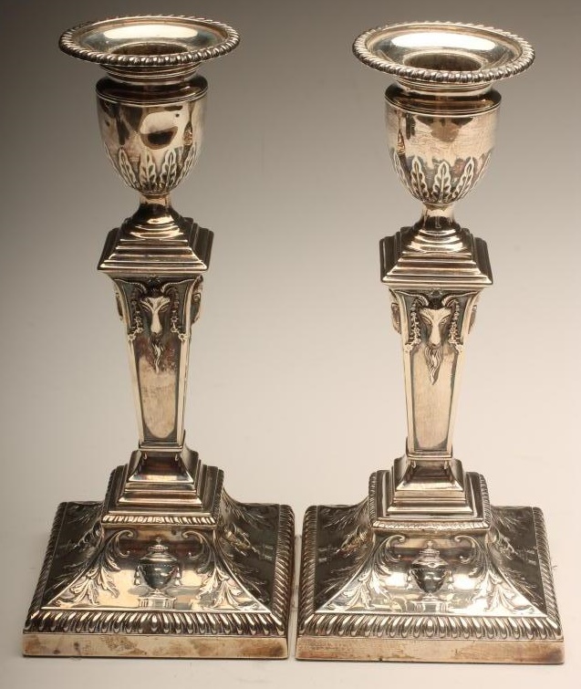 A PAIR OF LATE VICTORIAN SILVER CANDLESTICKS Image