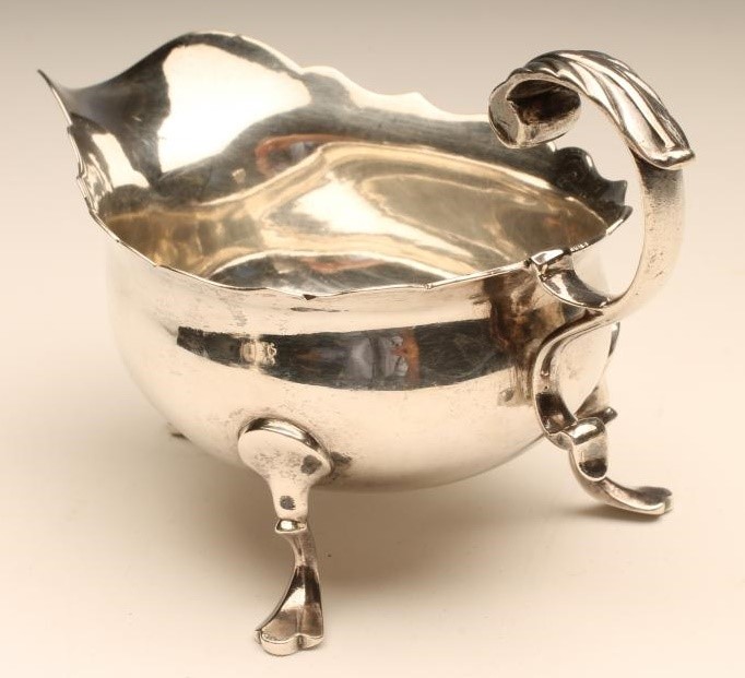 A GEORGE II SILVER SAUCEBOAT Image