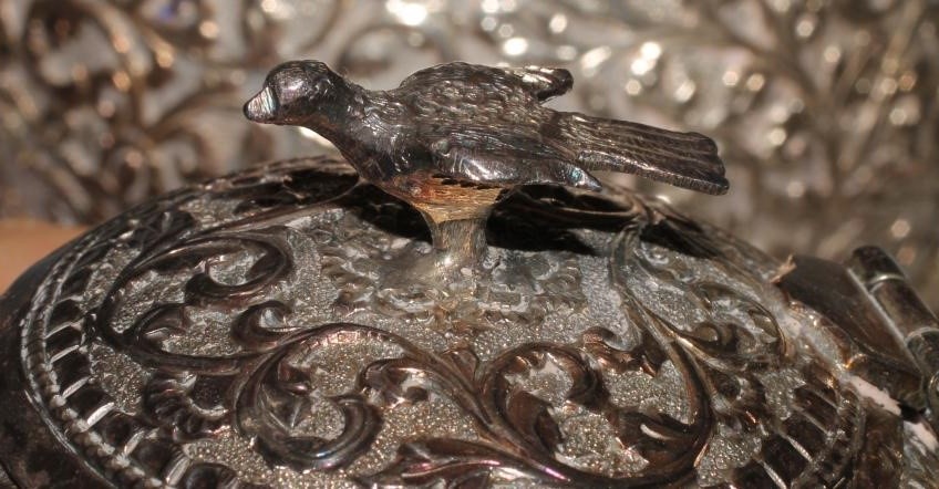 AN EASTERN WHITE METAL THREE PIECE TEA SERVICE Image