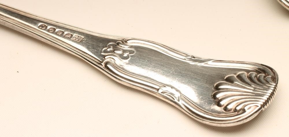 A SET OF FOUR LATE GEORGE III SILVER BASTING SPOONS Image