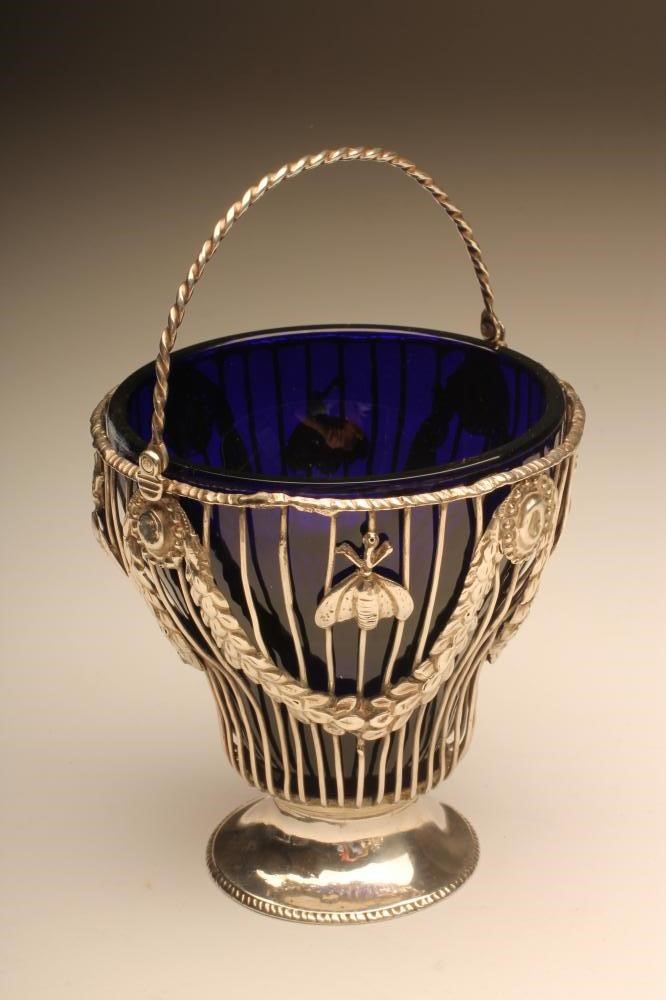 A GEORGE III SILVER WIREWORK SUGAR BASKET Image