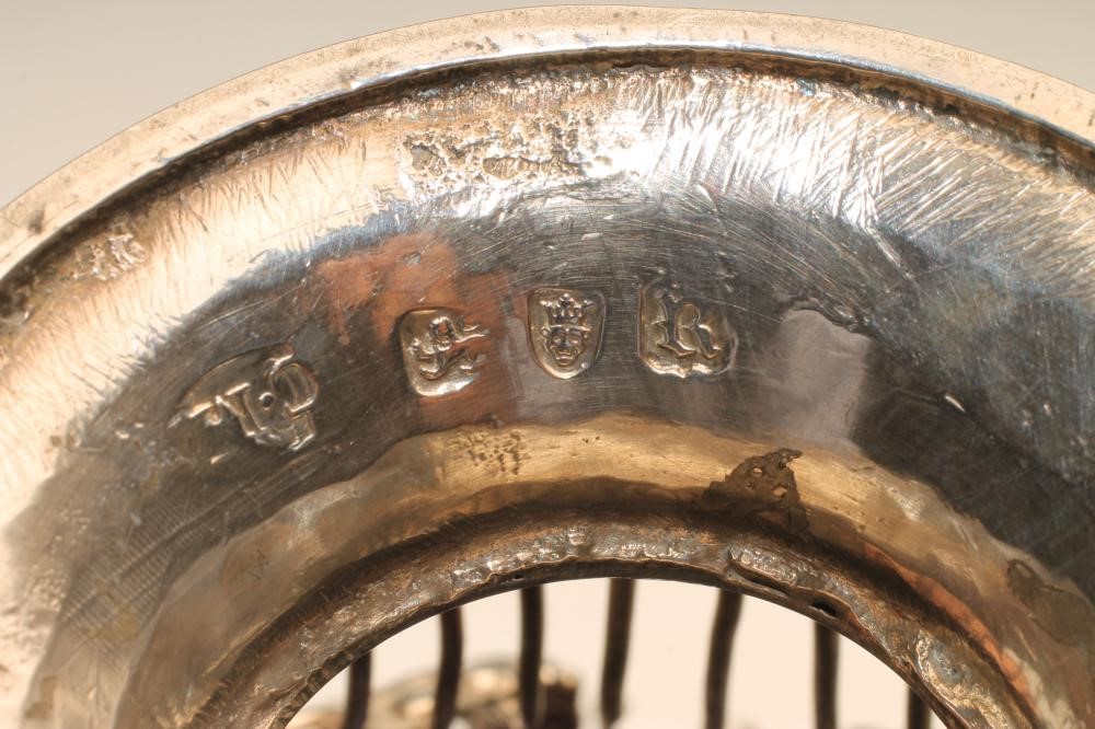 A GEORGE III SILVER WIREWORK SUGAR BASKET Image