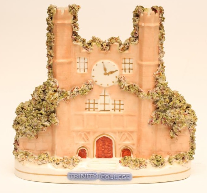 A VICTORIAN STAFFORDSHIRE PORCELLANEOUS FLATBACK MODEL of Trinity College encrusted with shredded Image