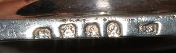 A GEORGE III SILVER MILK JUG Image